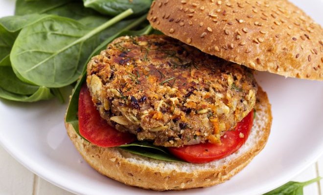 Vegan burger with spinach (made with beans and vegetables)