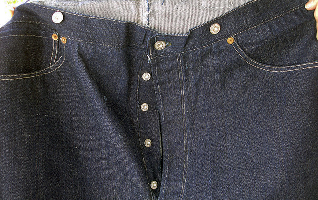 This undated photo provided by Daniel Buck Auctions & Appraisals shows the front of a pair of 1893 Levi-Strauss denim blue jeans in pristine condition that will go up for auction Saturday, Nov. 5, 2016 in Lisbon Falls, Maine. The auction house said the jeans were ordered for Solomon Warner, a businessman and pioneer who participated in the creation of the Arizona Territory. Warner wore them only a few times before falling ill. He died in 1899. (Daniel Buck Soules/Daniel Buck Auctions & Appraisals via AP)